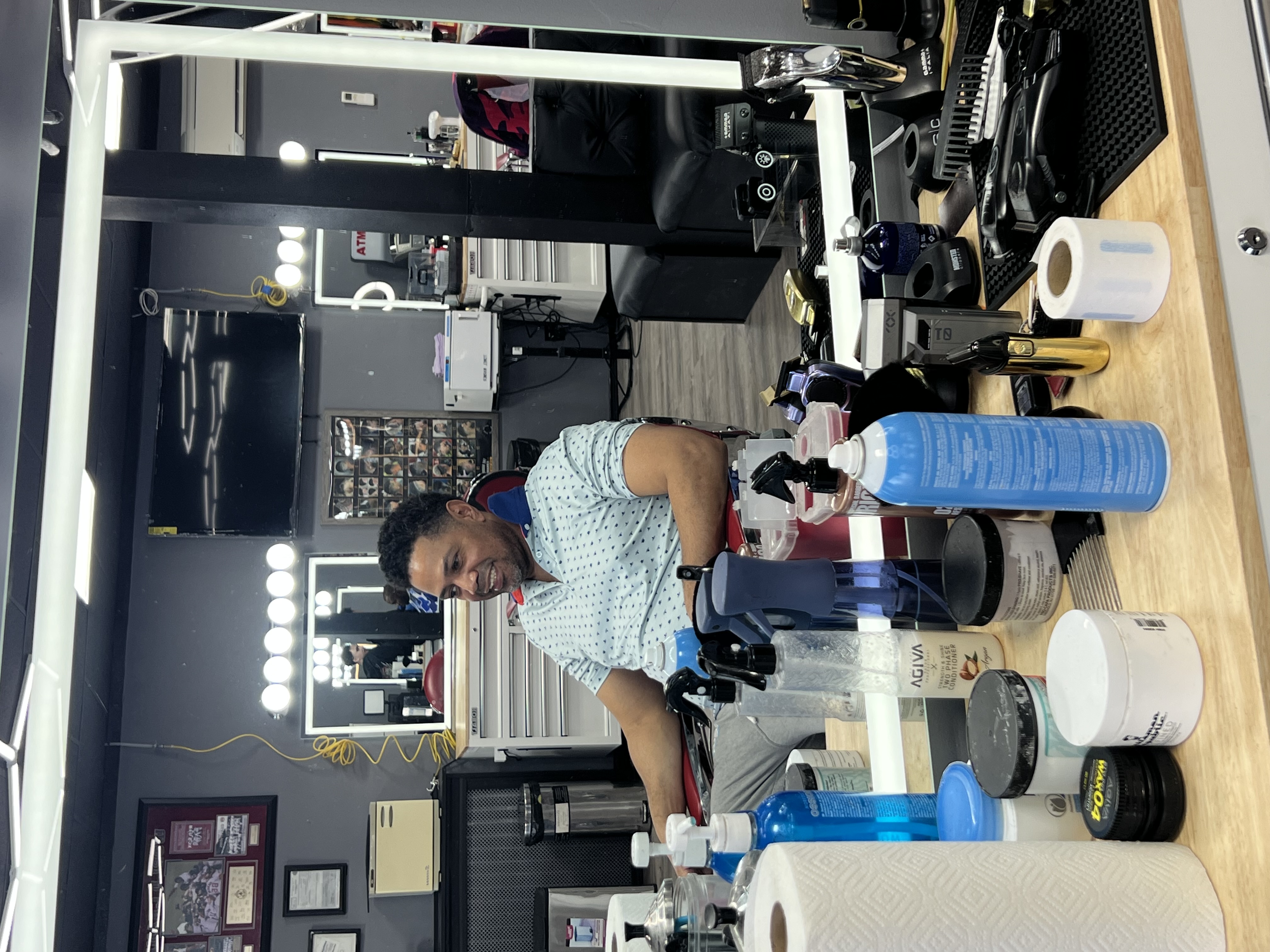 Rey, owner of The Legends Barber Shop